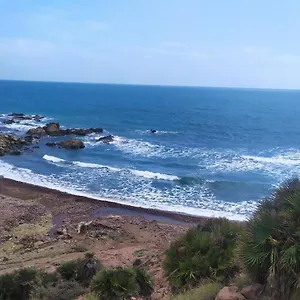 En Frente Del Puerto Séjour chez l'habitant
